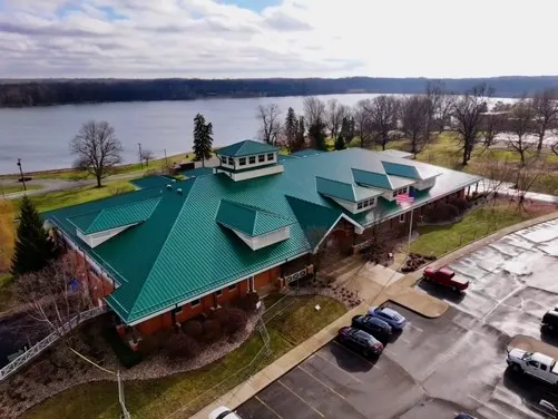 Tarping and dry-in on a Williams Glen commercial roof